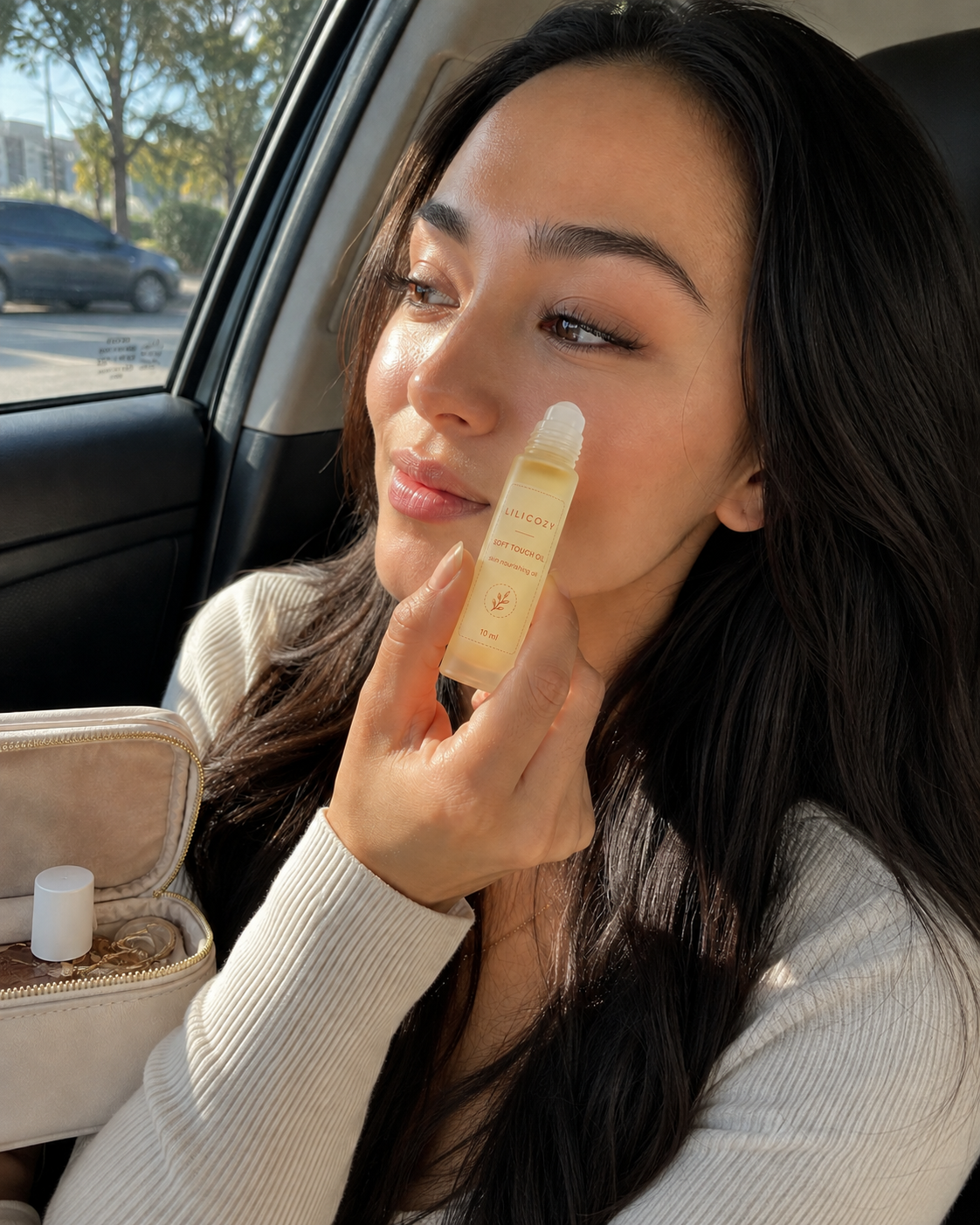 soft-touch-oil-roll-on:10ml bottle ON FACE.png